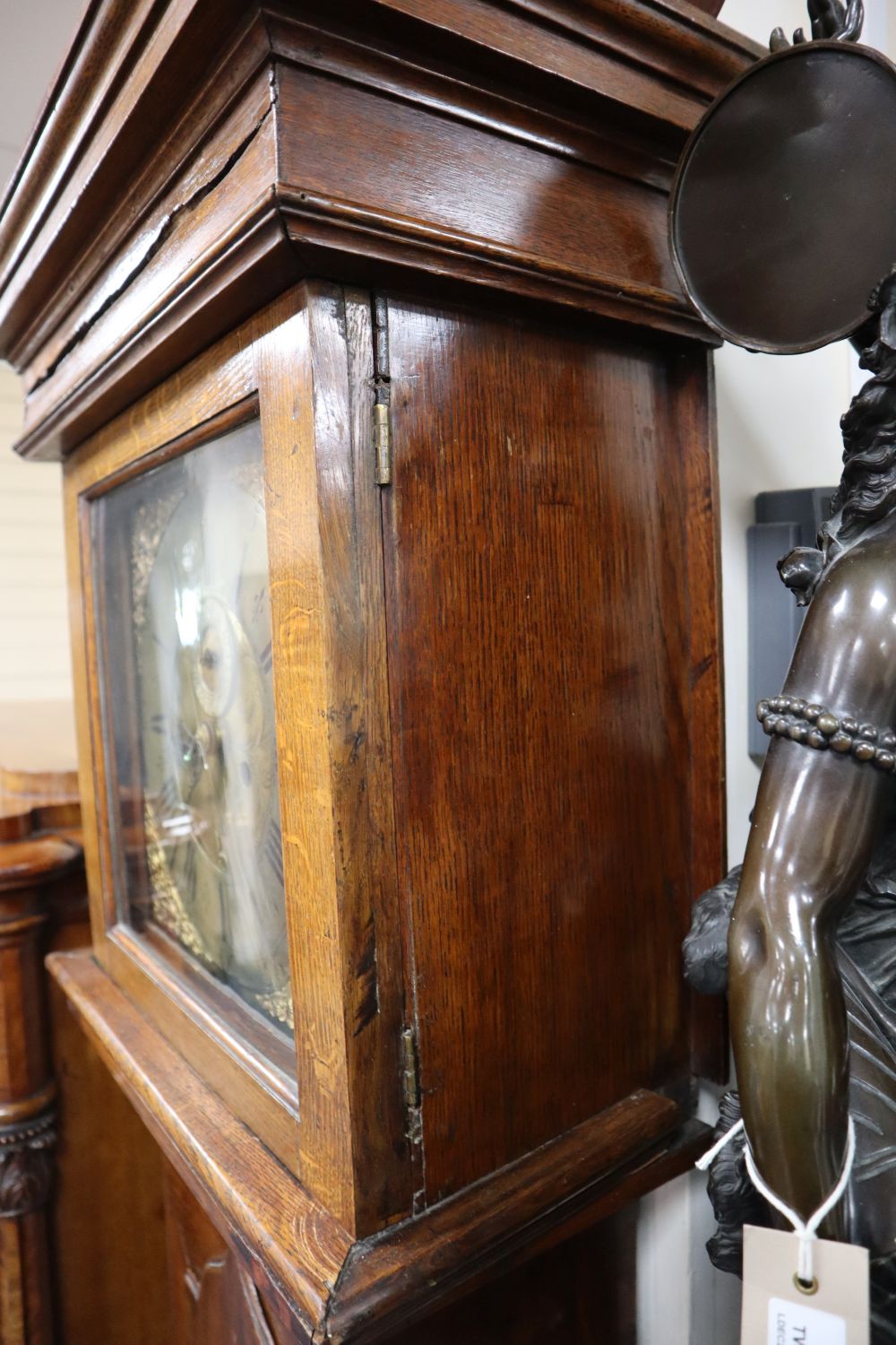 A George III oak 30-hour longcase clock marked Spinney, Blandford